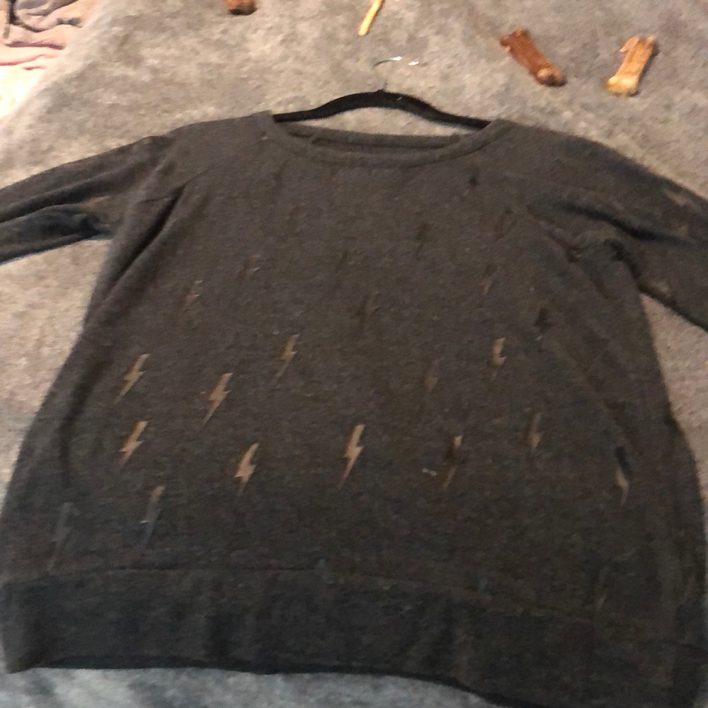 Charcoal grey sweater with lightning bolts throughout with front and back